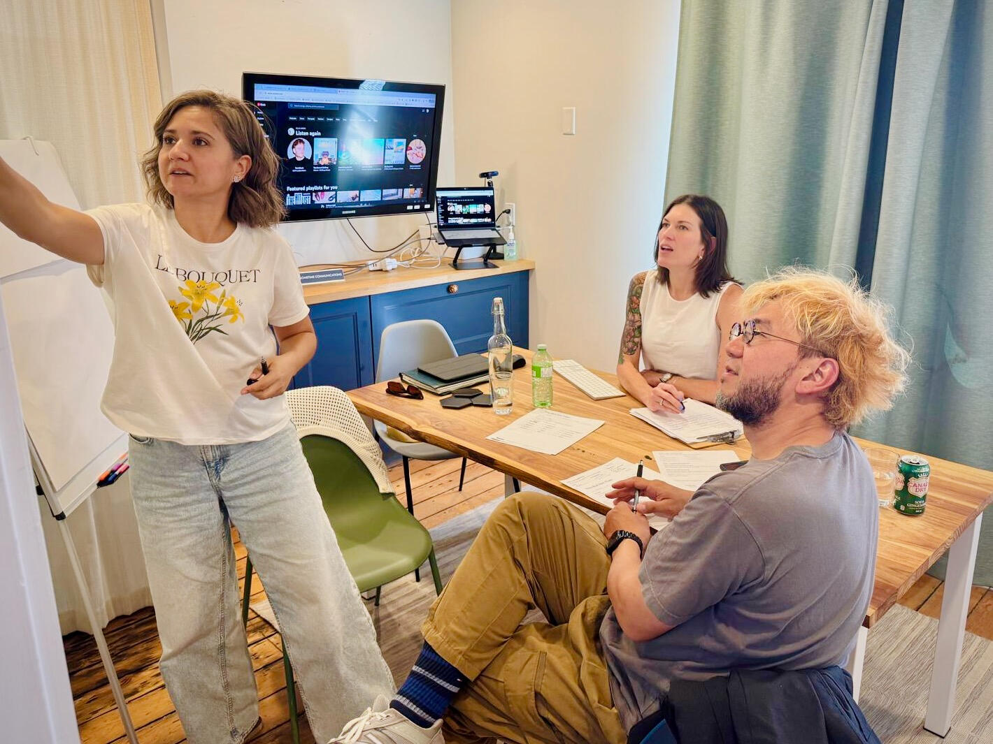 joanna and team working on a branding strategy in an office